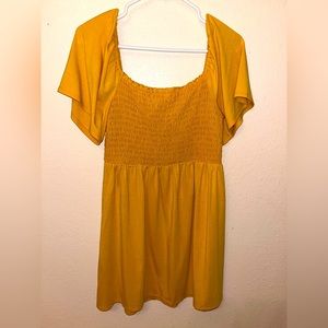 A BeBop dress for spring. Color yellow gold. Light weight.
